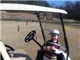 Spencer playing golf with Catherine and candy.jpg